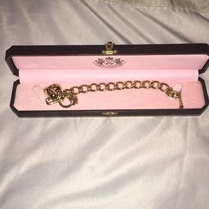 Juicy Couture charm bracelet. NEVER WORN.